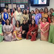 Elementary staff dressed in traditional attire to celebrate Diwali